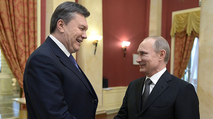 9042c2c fb75583 yanuk putin getty